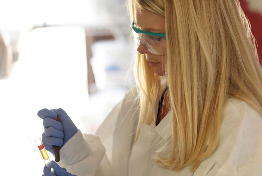 our track record, female nurse conducting a test, triad clinical trials